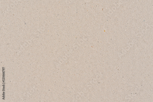 Light brown or beige color cardboard recycled paper, seamless tileable texture, image width 20cm
