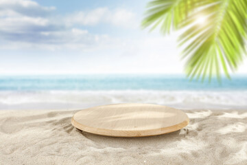 Summer beach and wooden pedestal. 