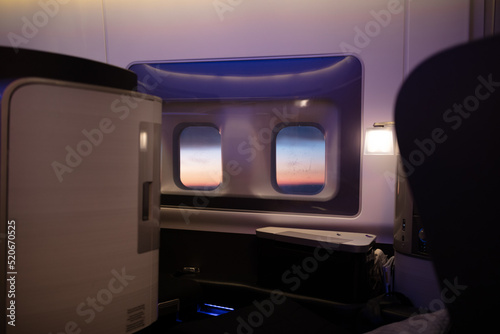 Modern and comfortable interior of business jet aircraft photo