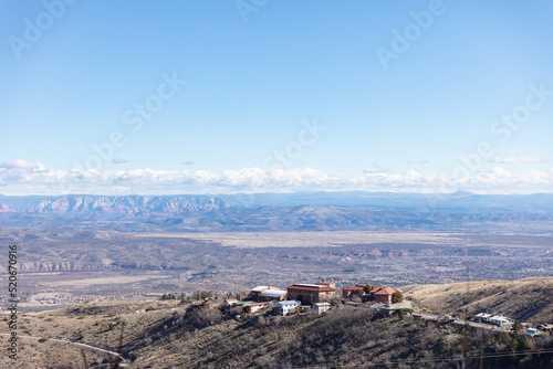 View of red rock mountains in Sedona Arizona taken from mountaintop in Jerome Arizona photo