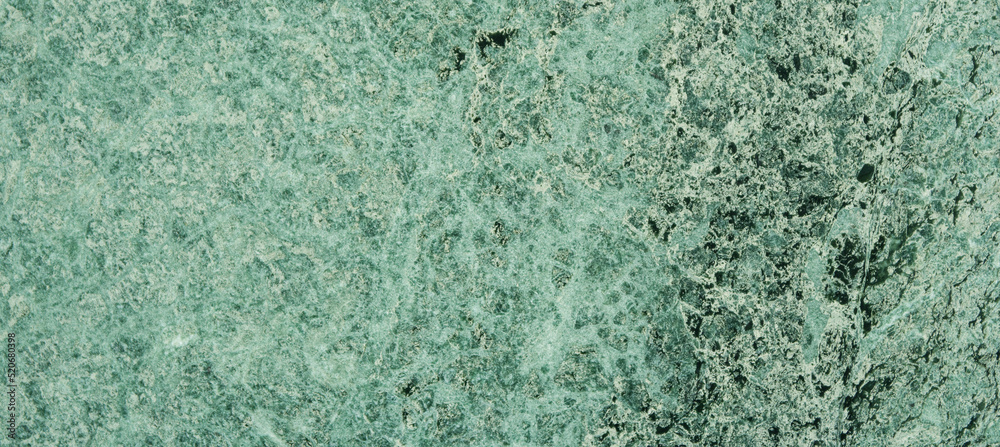 Green marble. Natural stone wall with abstract pattern.