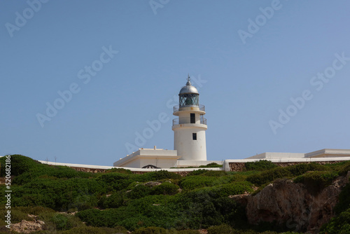 Cape de Cavalleria - the northernmost point of the Minorca island. Lighthouse on the Cap de Cavalleria. Minorca (Menorca), Spain