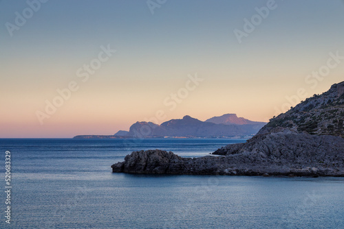 A view of the east coast of the island of Rhodes at sunset, Greece, Europe.