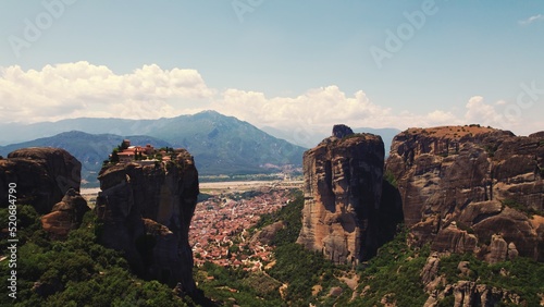 The Meteora Monasteries in Greece as a touristic destination from around 14th century. The mix between stunning architecture and nature. High quality photo photo