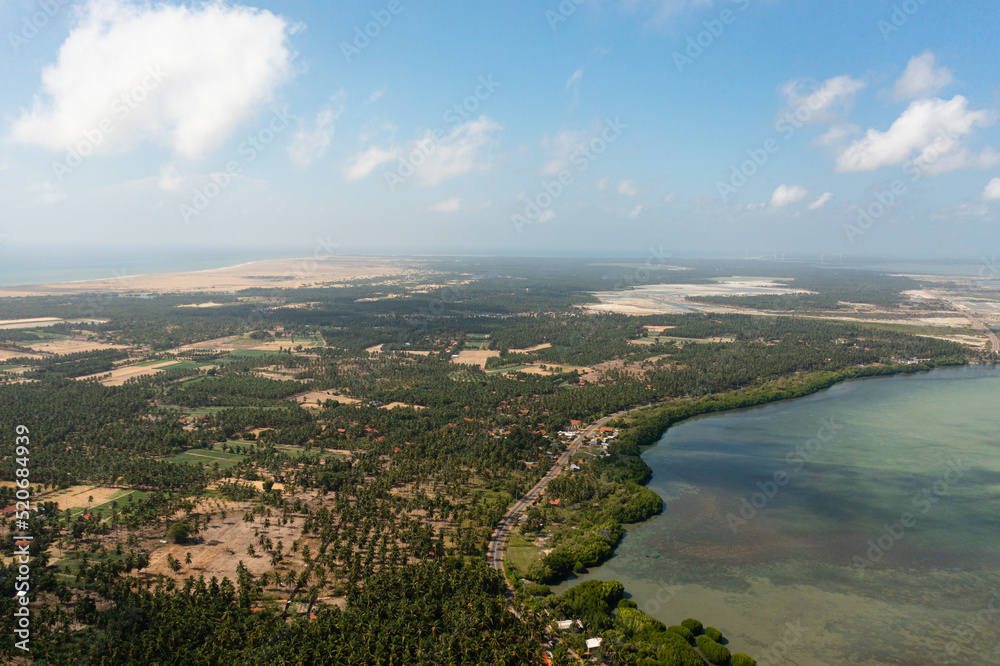 Top view of Coastline of Kalpitiya peninsula with palm trees Sri Lanka.