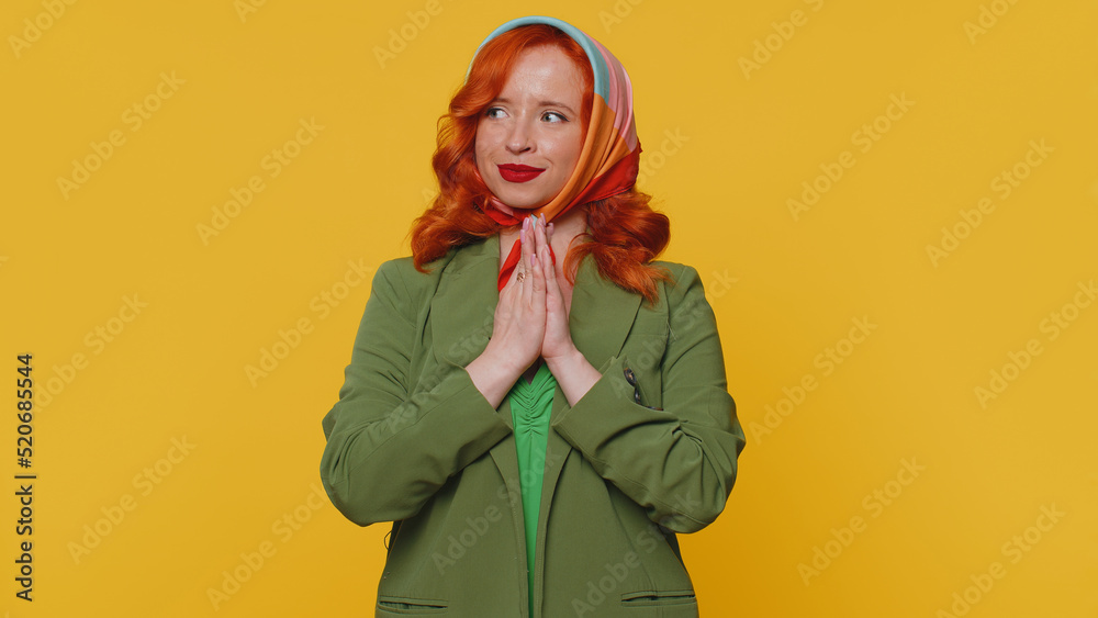 Sneaky cunning woman with tricky face gesticulating and scheming evil plan, thinking over devious villain idea, cunning cheats, jokes and pranks. Redhead girl on yellow studio background alone indoors Sneaky cunning woman with tricky face gesticulating and scheming evil plan, thinking over devious villain idea, cunning cheats, jokes and pranks. Redhead girl on yellow studio background alone indoors