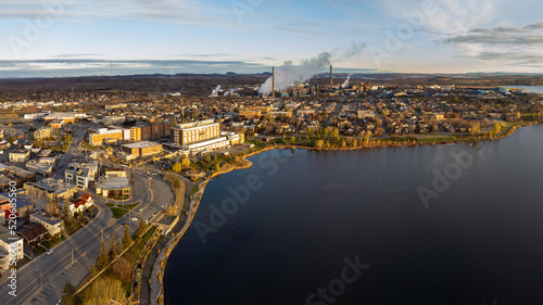 Aerial panoramic view of Rouyn-Noranda City and Osisko Lake on sunset time. Abitibi-Temiscamingue, Quebec, Canada.
