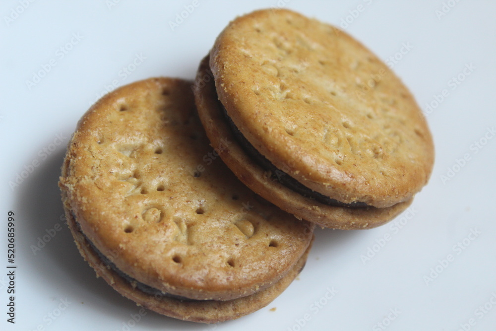 two whole wheat crackers with chocolate jam filling