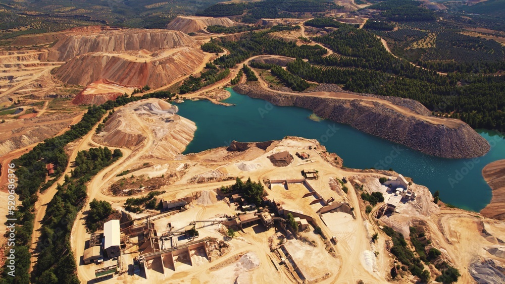 Human and the environment. Development concept. Open pit mine seen from aerial perspective. Greece. High quality photo