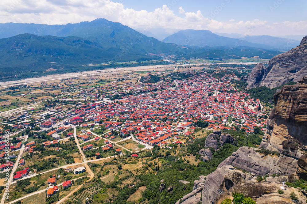 great aerial view of the town Kalambaka near the famous Meteora, tourist accommodation and real estate in Greece. High quality photo