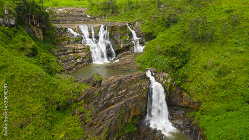 Beautiful waterfall in the mountains and tea estate. St. Clair Falls  Sri Lanka.