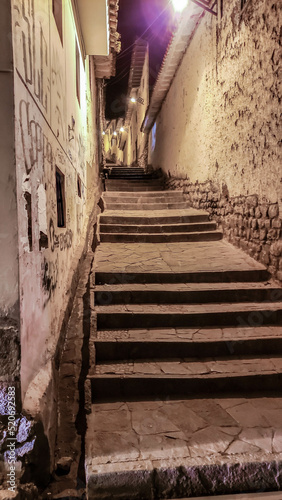 Cusco, Peru; 25 07 2022: Cusco sacred valley of the incas pathway lifestyle of city touristic capital. Multiethnic both Quechua and Inca indigenous ruins heritage with colonial architecture photo