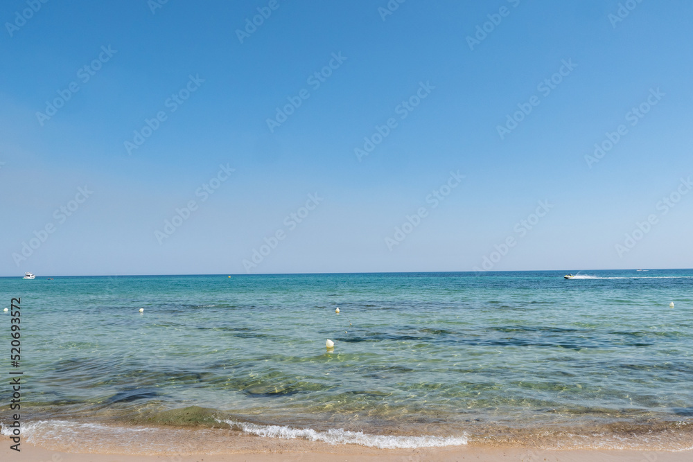 Coastline of the turquoise mediterranean ocean on summer, Hamammet, Tunisia.