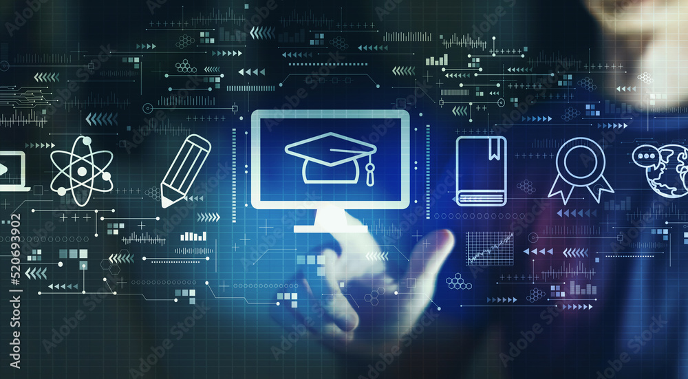 Fototapeta premium E-learning concept with young man touching a digital screen at night