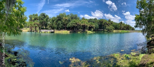 Blue green lake at Gemini Springs State Park just north of Orlando in Debary, Florida
