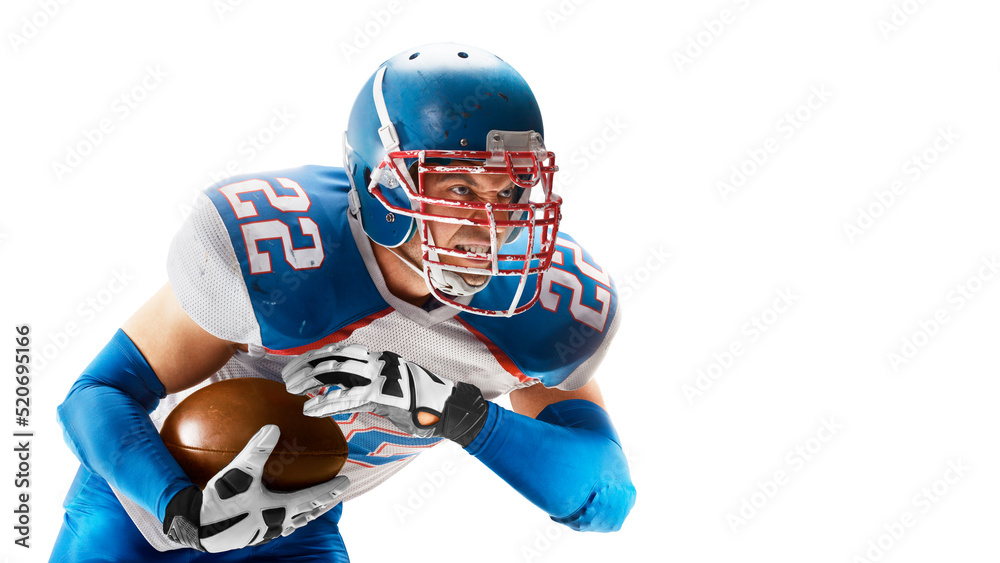 Sport closeup. American football. Young agile american football player running fast towards goal line. Sports emotions. Sportsman in action