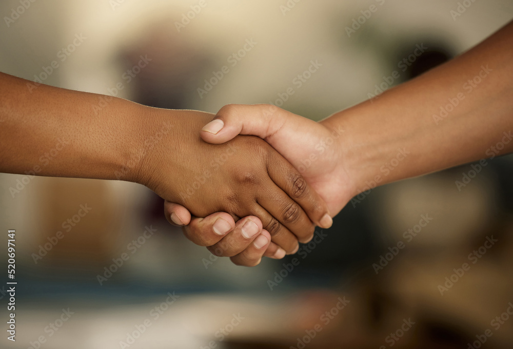 Closeup hands in handshake showing meeting, success and team support. Manager welcoming, promoting or agreeing with colleague in hand gesture. Two people symbolizing unity, power or strength together Closeup hands in handshake showing meeting, success and team support. Manager welcoming, promoting or agreeing with colleague in hand gesture. Two people symbolizing unity, power or strength together