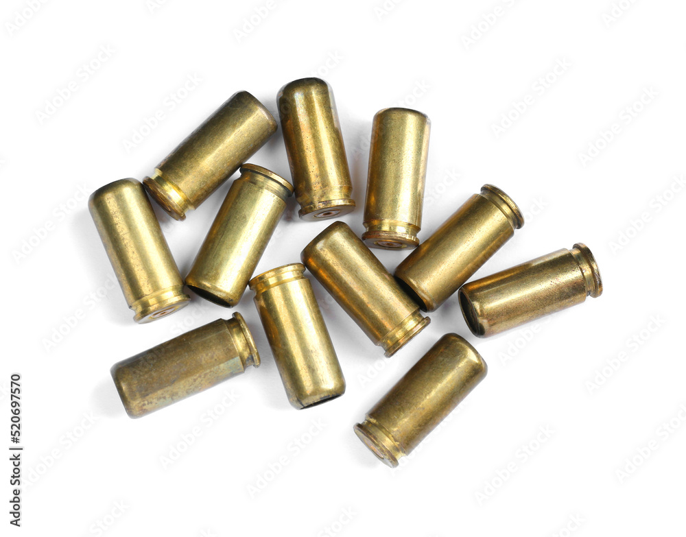 Cartridge cases isolated on white, top view. Firearm ammunition Cartridge cases isolated on white, top view. Firearm ammunition