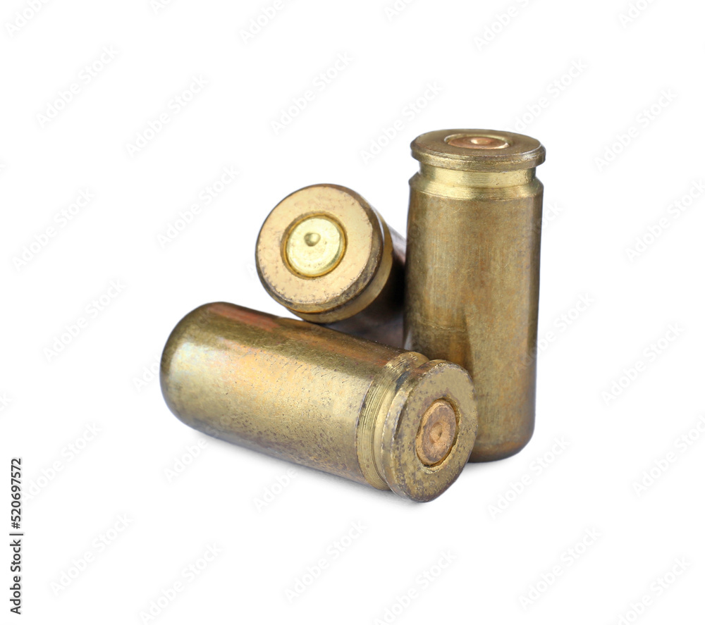 Cartridge cases isolated on white. Firearm ammunition Cartridge cases isolated on white. Firearm ammunition
