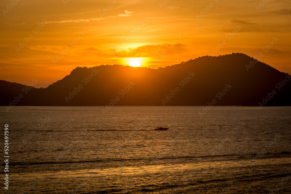 Sunset on the sea at the coast of Angra dos Reis town, State of Rio de Janeiro, Brazil. Photo taken with Nikon D7100, 18-200 lens, at 90mm, 1/160 f 6.3 ISO 100. Date: Dec 28, 2016