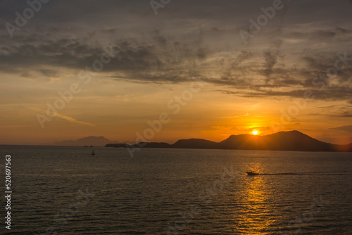 Sunset over the sea at the coast of Angra dos Reis town, State of Rio de Janeiro, Brazil. Photo taken with Nikon D7100, 18-200 lens, at 28mm, 1/60 f 11 ISO 100. Date: Dec 28, 2016