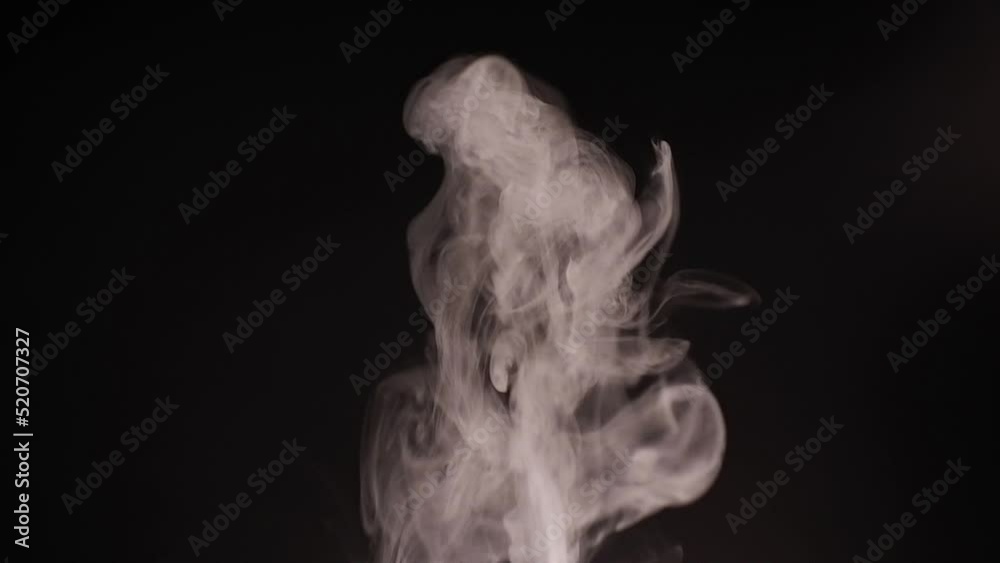 White smoke, fog, mist, vapor on a black background. White smoke, fog, mist, vapor on a black background.