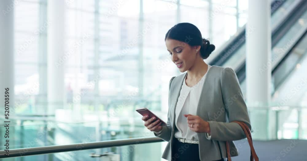 Businesswoman holding a phone texting, checking emails and chatting online with instant text messaging app. Trendy, and modern corporate boss walking while reading text messages and looking confident Businesswoman holding a phone texting, checking emails and chatting online with instant text messaging app. Trendy, and modern corporate boss walking while reading text messages and looking confident