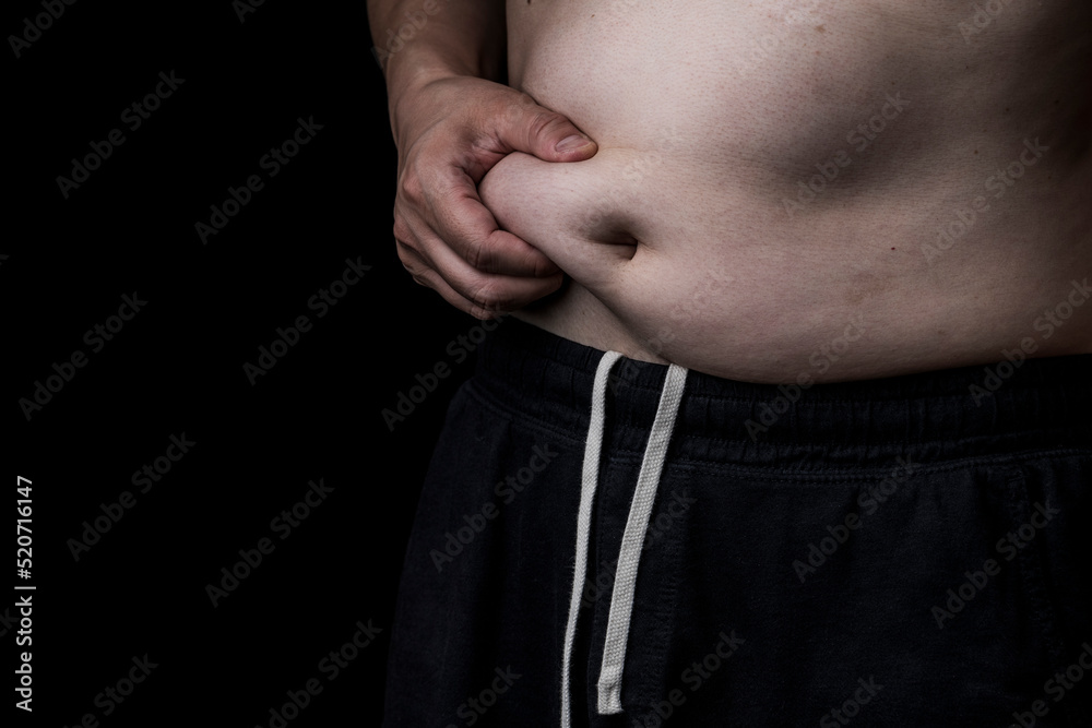 Naklejka premium 中高年の肥満男性のお腹