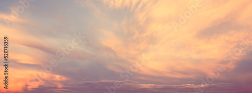 Soft image of sky in sunset with cloud. abstract nature background in retro color fillter effect. © jakkapan