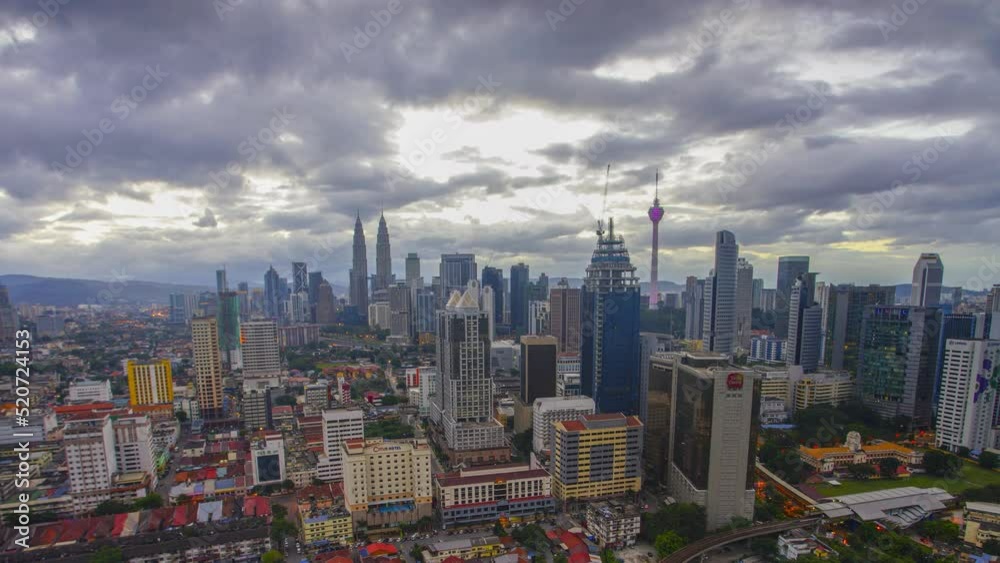 Timelapse of Kuala Lumpur city during sunrise. Pan right effect Timelapse of Kuala Lumpur city during sunrise. Pan right effect
