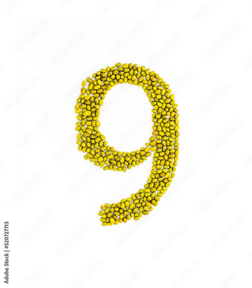 Number 9 made from mung beans. Green mung bean font. Alphabet made from green gram . White background. Dry green maash seeds. Number 9 made from mung beans. Green mung bean font. Alphabet made from green gram . White background. Dry green maash seeds.