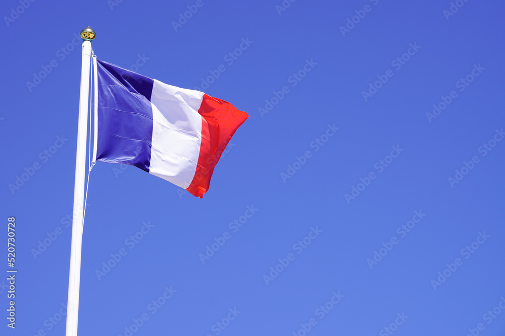 france flag french blue white red wave mat over a blue sky france flag french blue white red wave mat over a blue sky