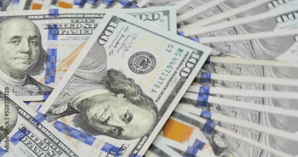 100 US Dollars Bills. Money banknotes background clockwise rotation. 100 US Dollars Bills. Money banknotes background clockwise rotation.