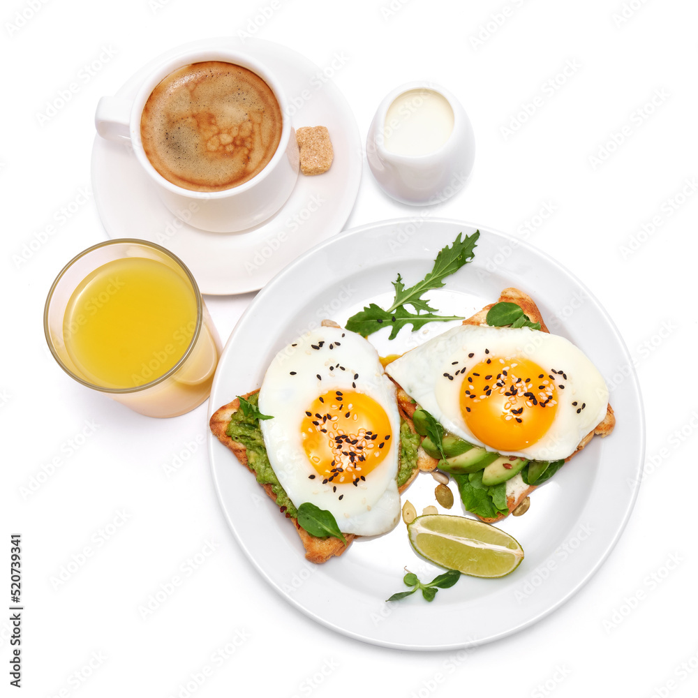 sliced avocado and fried egg on toasted bread isolated on white background sliced avocado and fried egg on toasted bread isolated on white background