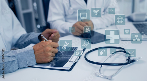 Medicine doctor using digital healthcare and network connection on hologram modern virtual screen interface icons  Medical technology futuristic concept.