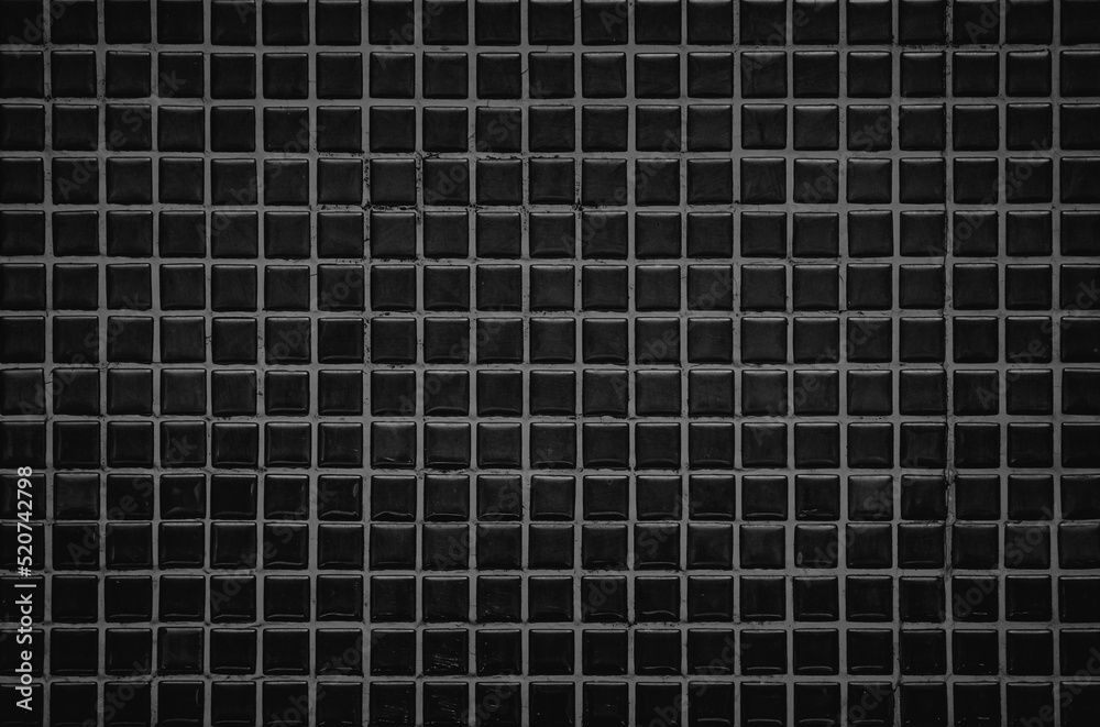 Dark black ceramic wall and floor tiles mosaic background in bathroom and kitchen. Design pattern geometric texture. Dark black ceramic wall and floor tiles mosaic background in bathroom and kitchen. Design pattern geometric texture.