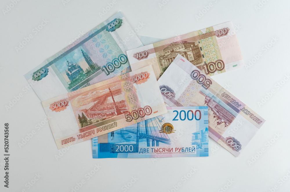 Russian rubles background. Money background and texture. Banknotes of different denominations Russian rubles background. Money background and texture. Banknotes of different denominations