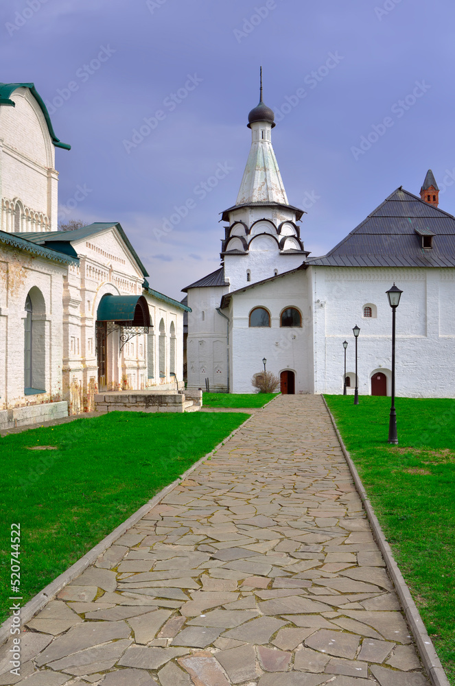 The male Spaso-Evfimiev Monastery. The path to the Assumption Refectory Church, a monument of Russian architecture of the XVI century. Suzdal, Russia, 2022