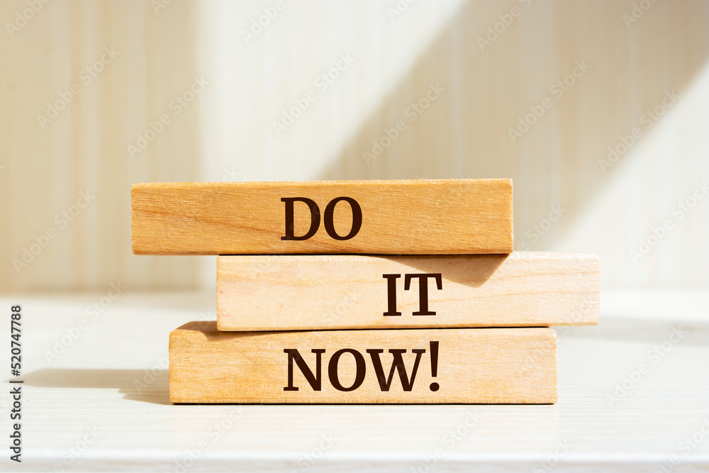 Wooden blocks with words 'Do it now!'. Wooden blocks with words 'Do it now!'.