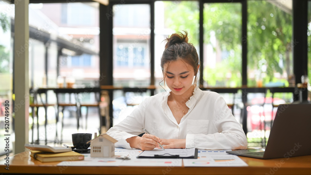 Real estate agent preparing contract document to customer. Real estate investment, purchase and sale concept Real estate agent preparing contract document to customer. Real estate investment, purchase and sale concept