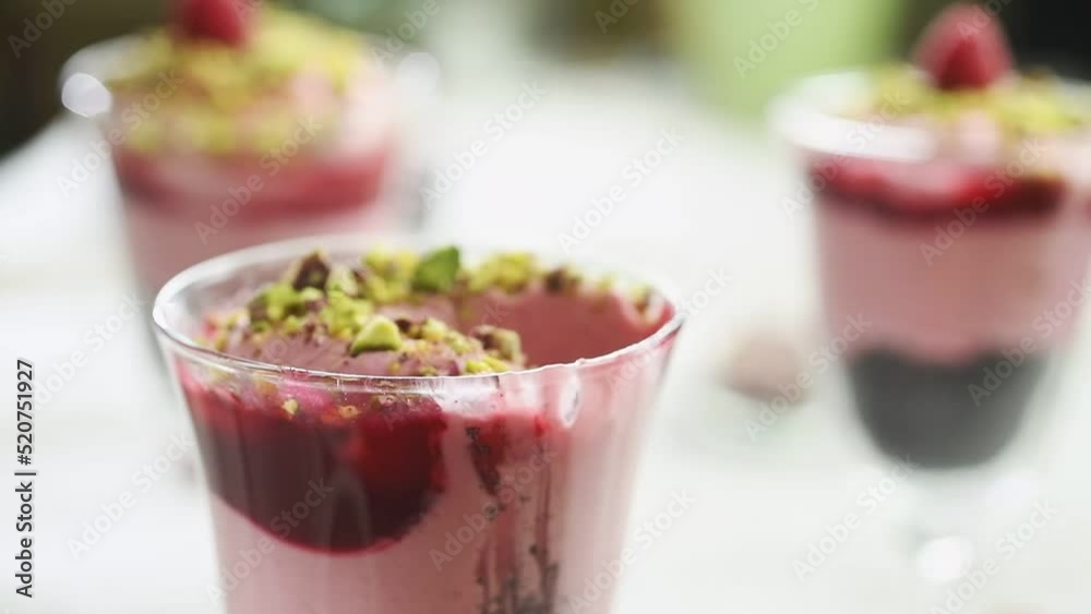 The chef tastes the freshly prepared raspberry cheesecake.
The chef tastes the freshly prepared raspberry cheesecake.
