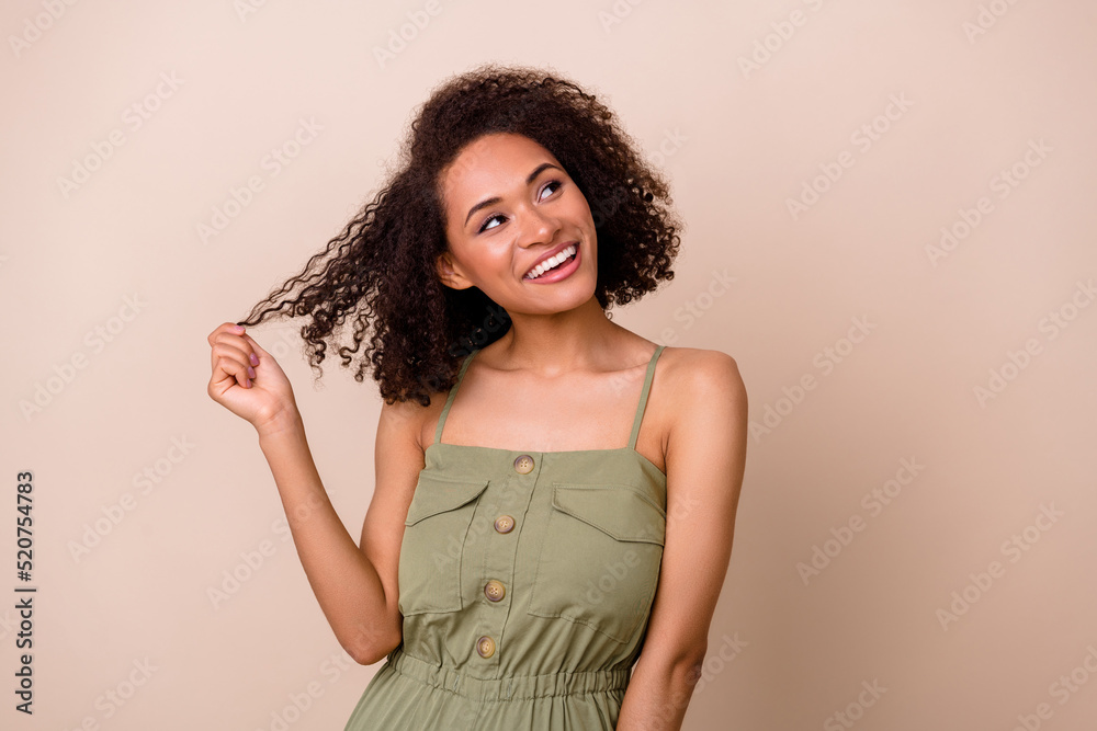 Photo of pretty cute lady coquette curly chevelure imagine cunning plan look empty space isolated on beige color background Photo of pretty cute lady coquette curly chevelure imagine cunning plan look empty space isolated on beige color background