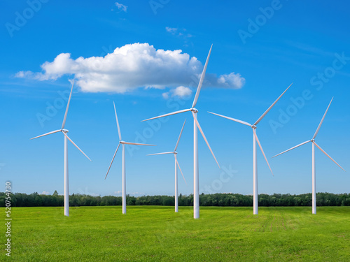 Field with wind turbines. L...