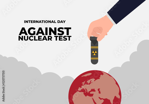 World International day against nuclear test banner poster. With hand put bomb on earth on white grey color background.