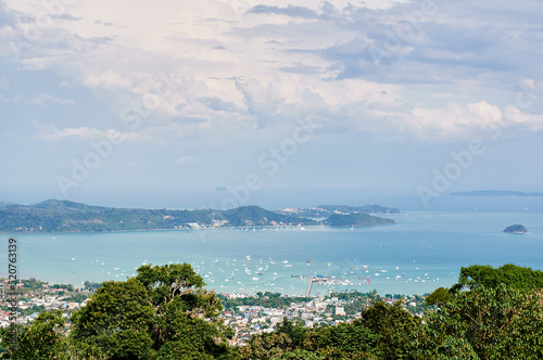 Fototapeta Naklejka Na Ścianę i Meble -  Phuket island view point. Beautiful tropical landscape with city on the sea shore.