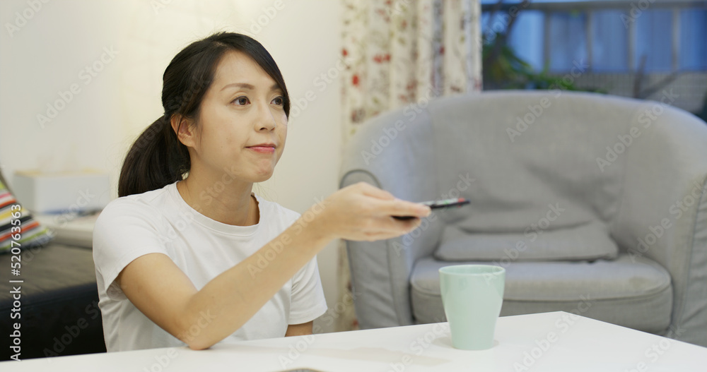 Woman watch TV at home Woman watch TV at home