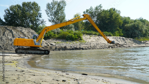 the dear that removes the bank from the Danube in order to increase the water level following the drought.