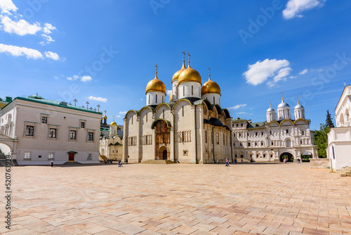 Sobornaya square of Moscow Kremlin with cathedral of Dormition (Uspensky Sobor), Patriarshy cathedral and palace of Facets (Granovitaya Palata), Russia photo