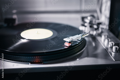 Turntable vinyl record player. Retro audio equipment for disc jockey. Sound technology for DJ to mix & play music.
