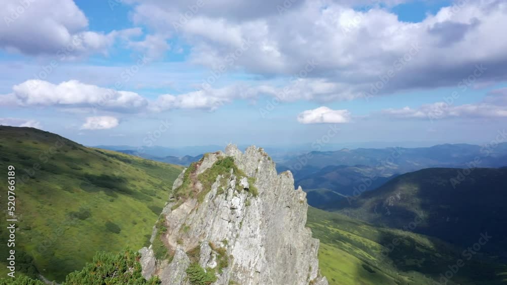 Aerial view of rocky peak of Spitz mountain in the Carpathian mountains, landscape of summer mountains. Aerial view of rocky peak of Spitz mountain in the Carpathian mountains, landscape of summer mountains.